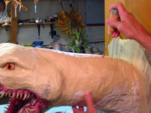 39 paper mache drogon-poke holes