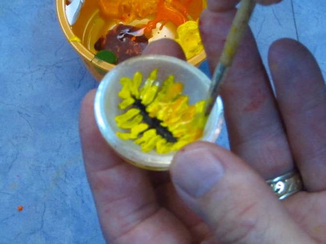 paper mache dragonfly- eyes orange added